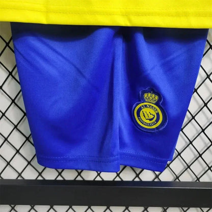 Conjunto de fútbol local de Al-Nassr 2023/2024 (camiseta + pantalón corto)