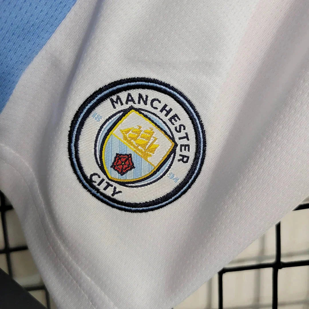 Conjunto de fútbol local del Manchester City 2023/2024 (camiseta + pantalón corto)