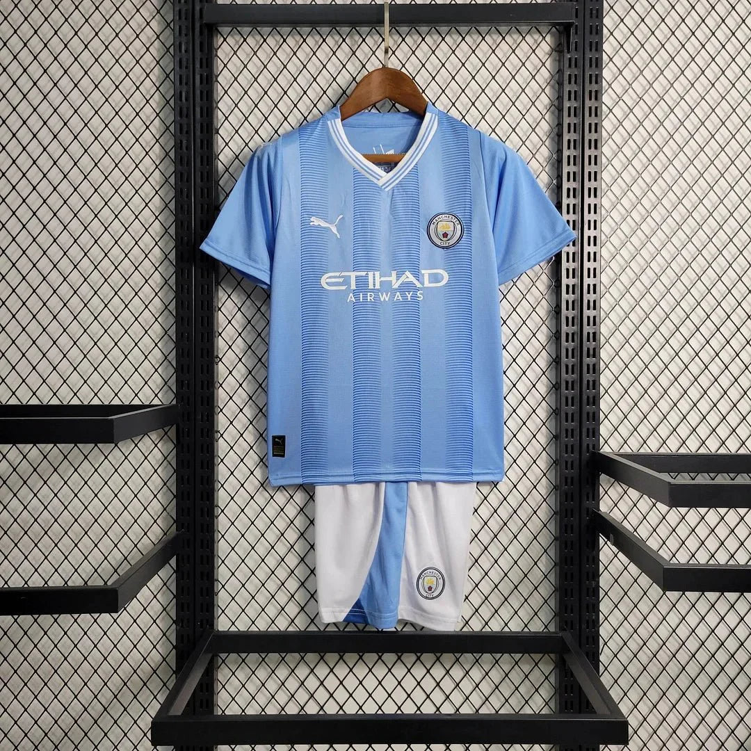 Conjunto de fútbol local del Manchester City 2023/2024 (camiseta + pantalón corto)